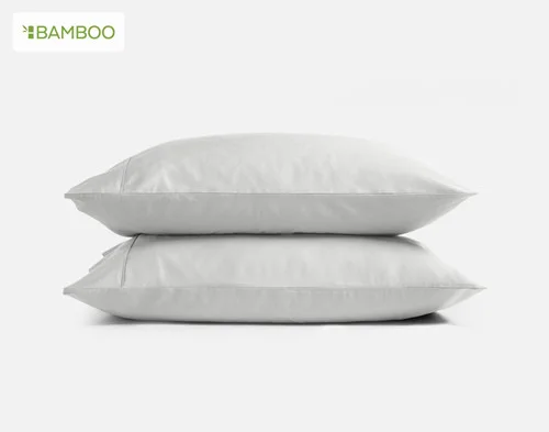 Our Bamboo Cotton Pillowcases with Activated Charcoal stacked on a white background.