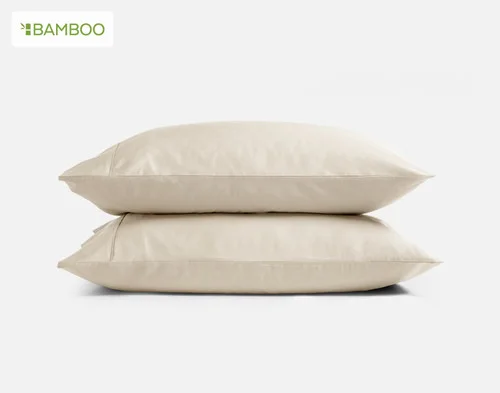 Our Bamboo Cotton Pillowcases in Driftwood Beige stacked on a white background.