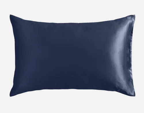 Our Mulberry Silk Pillowcase in Navy sitting against a solid white background.