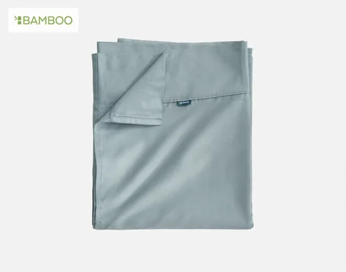 Our Bamboo Cotton Flat Sheet in Spruce Green folded on a white background.