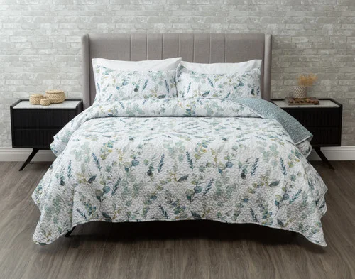 Front view of our Ariel Coverlet Set in a grey bedroom dressed over a queen-sized bed.