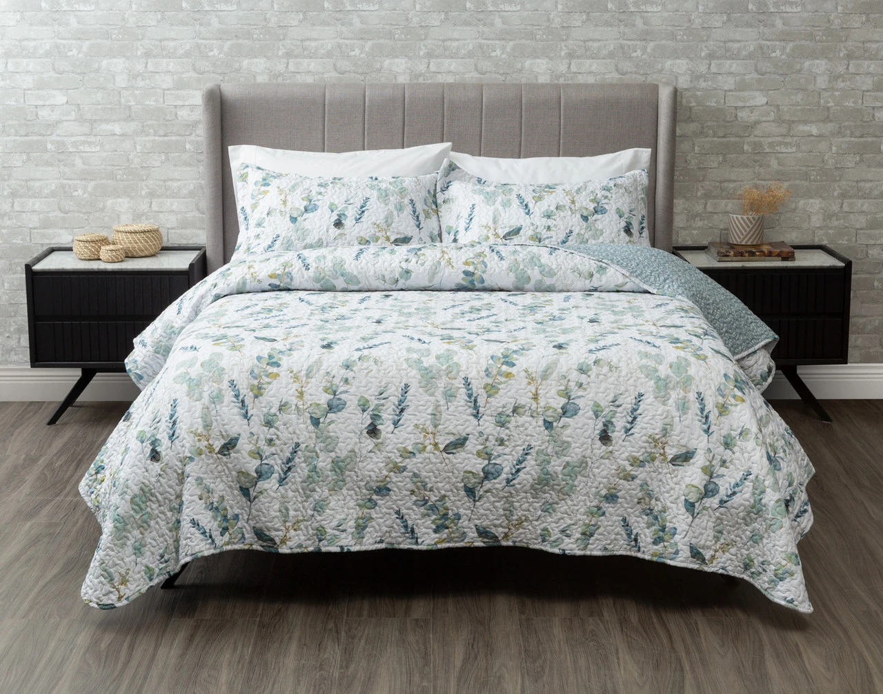 Front view of our Ariel Coverlet Set in a grey bedroom dressed over a queen-sized bed.