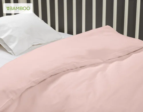 Close-up on our Bamboo Cotton Crib-Sized Duvet Cover in Petal to show its cozy softness.