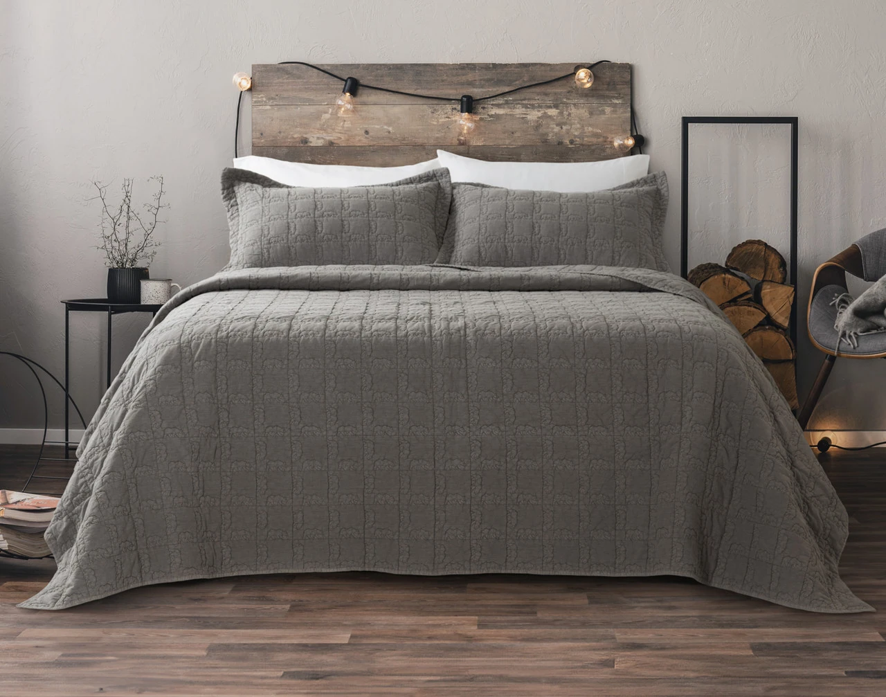 Our Bear Crossing Quilt Set dressing a queen bed in a Canadian room.