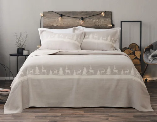 Front view of our Deer Trail Cotton Quilt Set dressing a queen bed in a Canadian bedroom.