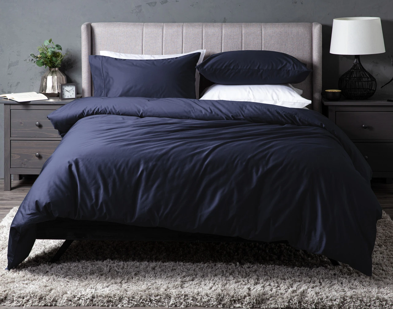 Front view of our Mountain Blue Dream Sateen Duvet Cover Set dressed over a grey bed.