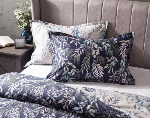 Our Kona Bay Pillow Shams at the head of a bed.