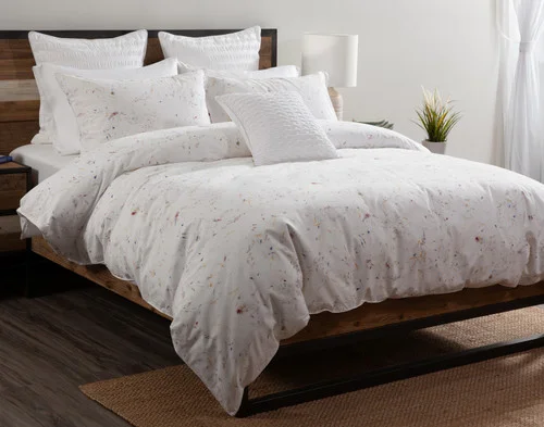 Our Memories Duvet Cover dressing a queen bed in a simple room.