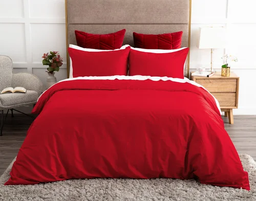 Front view of our Heartfelt Duvet Cover Set dressing a queen bed in a modern room.