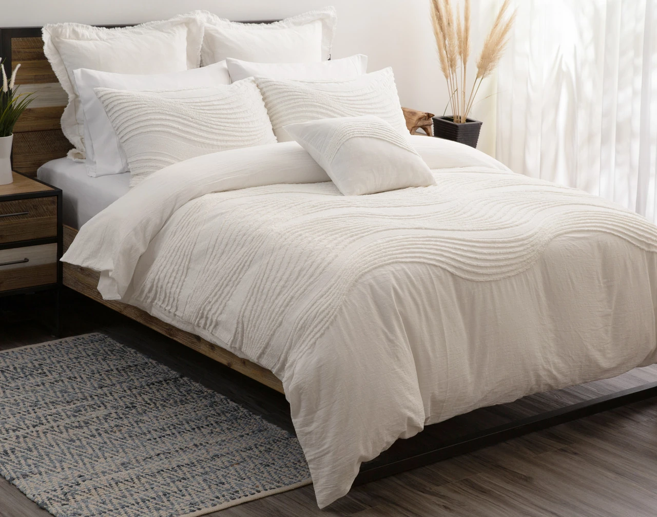 Our Savary collection dressing a queen bed in a clean, modern room.