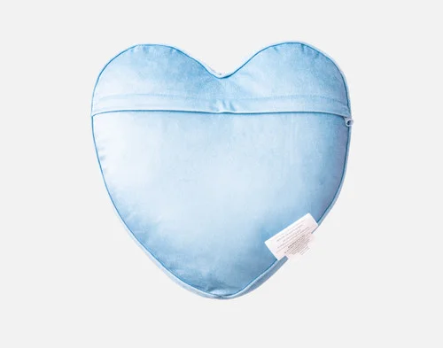 Close-up on the zipper enclosure on the back of our Love Bug Candy Heart Cushion.