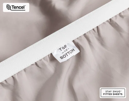 Close-up of Top & Bottom tag on the elastic of our BeechBliss TENCEL™ Modal Fitted Sheet in Beachcomber.