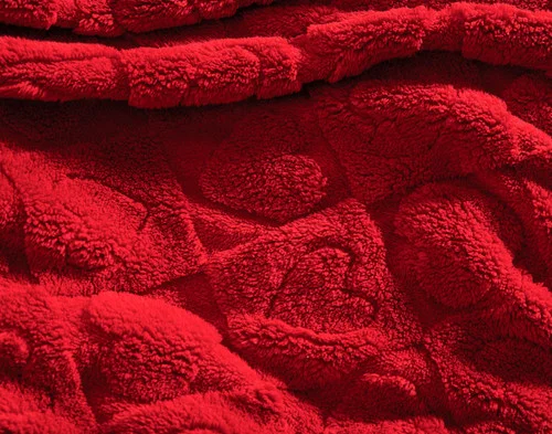 Close up on our Valentine's Fleece Throw - Etched Hearts to show its textured surface.