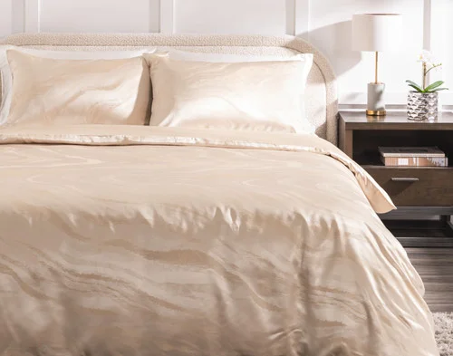 Front view of our Solace Silk Blend Duvet Cover Set dressed over a plain bed.
