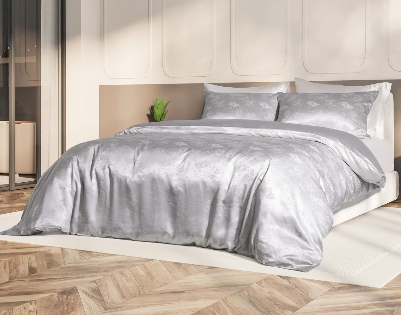 Our Reflections Silk Blend Duvet Cover Set dressed over a large bed in a sunlit bedroom.