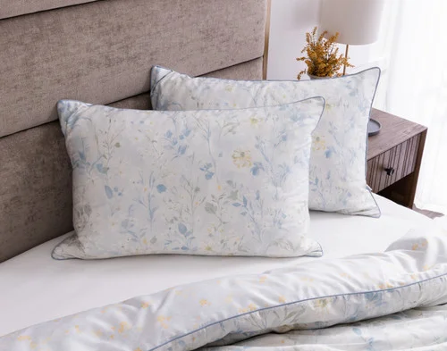 Our Josephine Pillow Shams decorating the head of a bed.