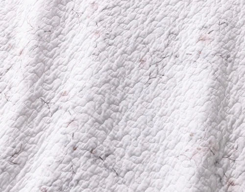 Close-up of the floral pattern on our Blossom Cotton Quilt Set.