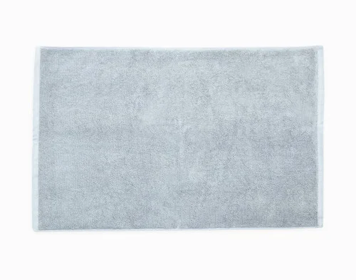 Top view of our Modal Cotton Bath Mat in Blue Dusk sitting against a solid white background.