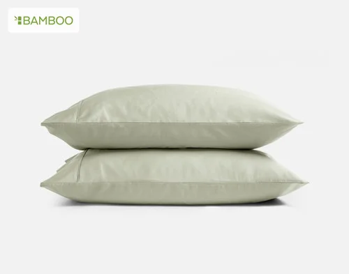 Our Bamboo Cotton Pillowcases in Thyme stacked on a white background.