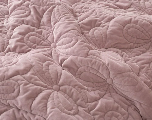 Close-up of the lilac velvet surface on our Bowknots Quilt Set.