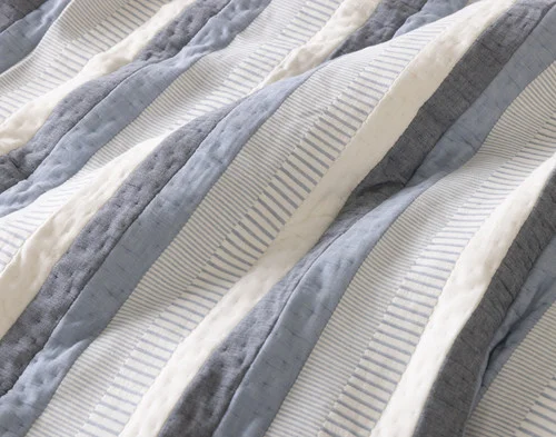 Close up on our Piers Cotton Quilt Set to show the texture.