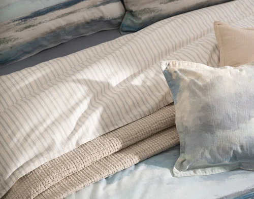 Our Windswept collection dressing the head of a bed with accessories.