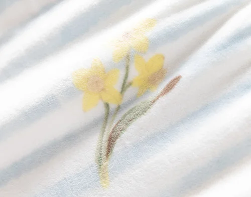 Close up a flower on our Daffodil Easter Fleece Throw.