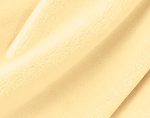 Close-up on our Velvet Plush Throw in Lemon Ice to show its soft velveteen texture.