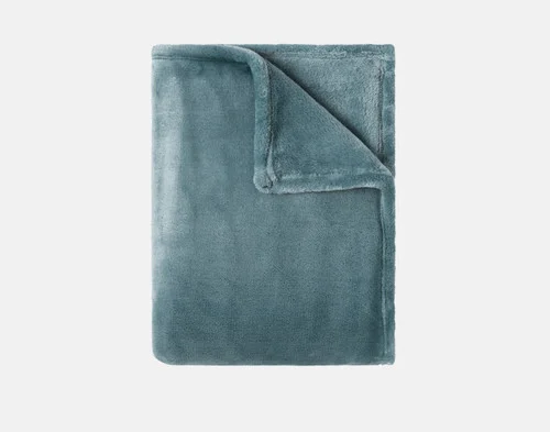 Our Velvet Plush Throw in Bluegrass folded neatly into a tidy square.