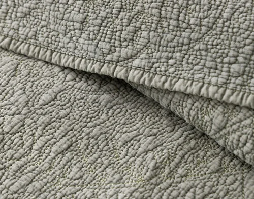 Folded edge on our Donegal Cotton Quilt Set to show its stonewashed cotton shell.