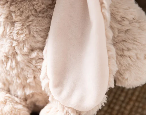 Close-up of the smooth ears on our Large Easter Plush Bunny Cushion.
