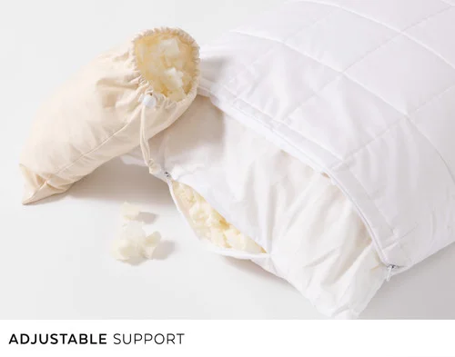The open edge and extra bag from our PureRest Pillow to show its wool and Talalay latex filling.