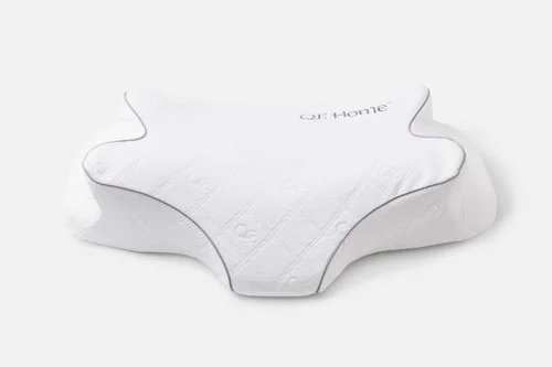 Front view of our Butterfly Memory Foam Pillow resting on a solid white ground.