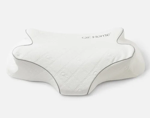 Front view of our Butterfly Memory Foam Pillow resting on a solid white ground.