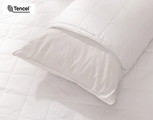 Our Ambience TENCEL™ Pillow Protector half-dressed over a pillow.
