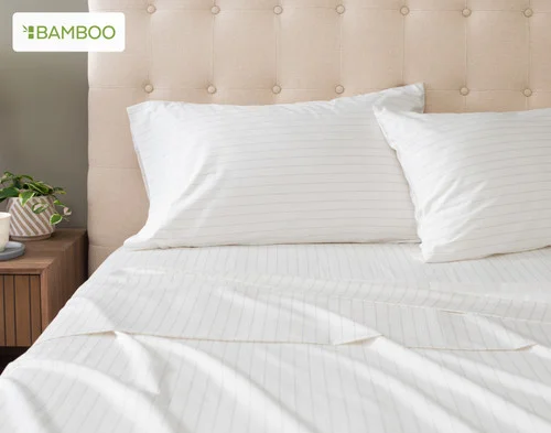Our Bamboo Cotton Pillowcase in Ocean Stripe against a white background.