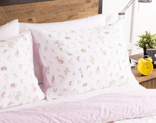 The head of a bed dressed in our Meadow Kids' Bamboo Cotton Comforter Set.