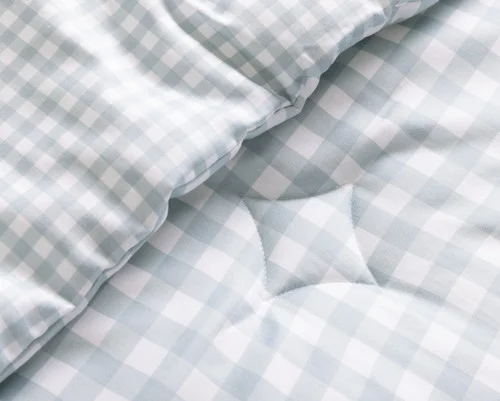 Close up on the folded surface of our Picnic Kids' Bamboo Cotton Comforter Set.