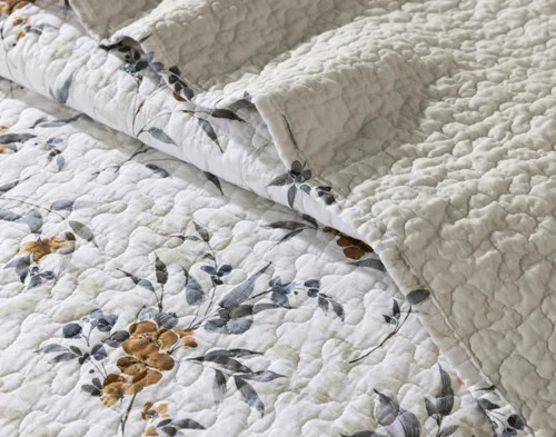 Close up on the folded surface of our Esther Cotton Quilt Set.