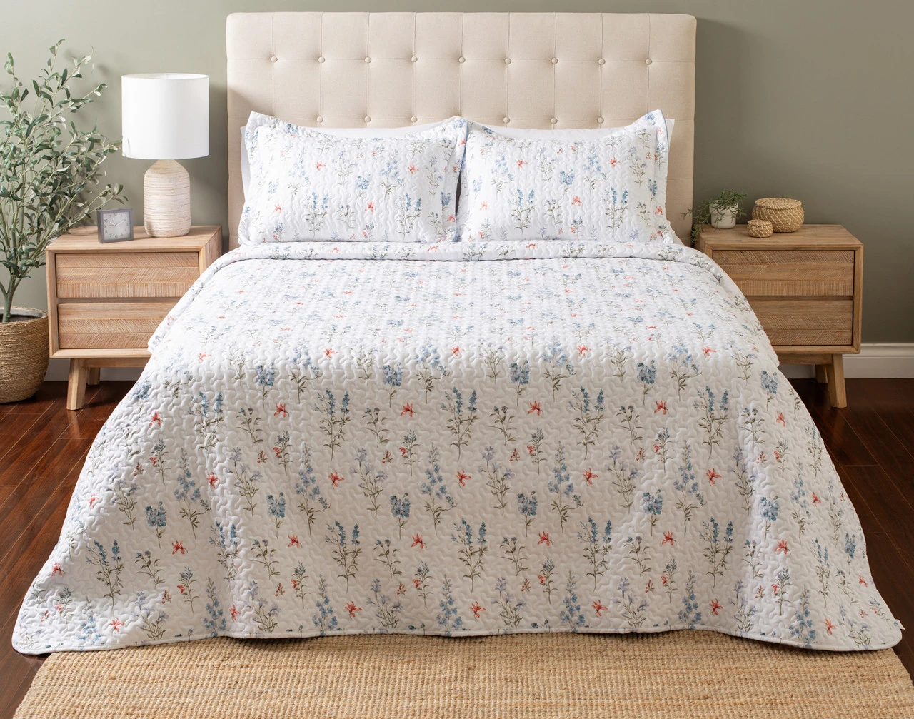 Front view of our Delphine Coverlet Set dressed over a plain queen bed.