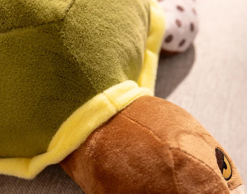 Close up on our Dotty Turtle Cushion.