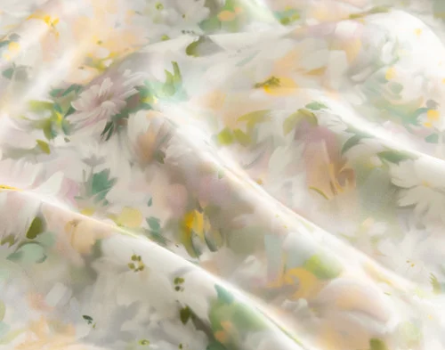 Close-up of the floral design and silk surface of our Mulberry Silk Pillowcase in Ruthana.
