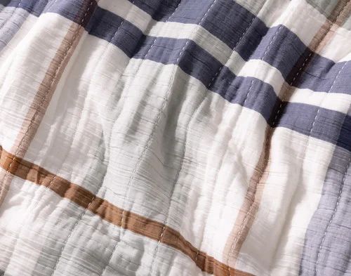 Close up on the ruffled surface of our Finn Quilt Set.