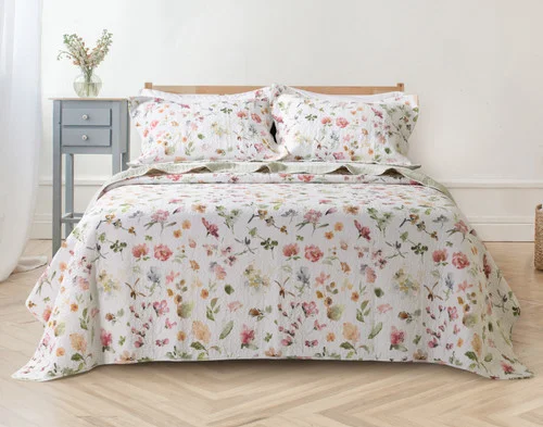 Front view of our Rosalia Cotton Quilt Set dressed on a queen bed.