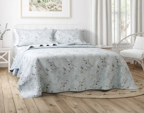 Front view of our Adeline Cotton Quilt Set in a brightly lit bedroom.