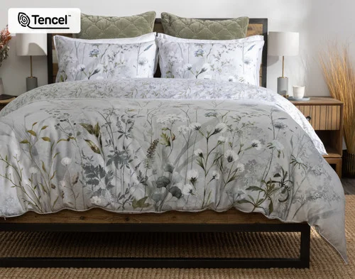 Front view of our Greydon Duvet Cover dressing a queen bed in a simple bedroom.