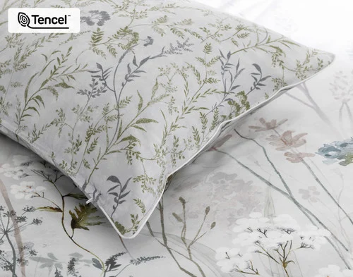 The reverse side of our Greydon Pillow Sham atop our Greydon Duvet Cover.