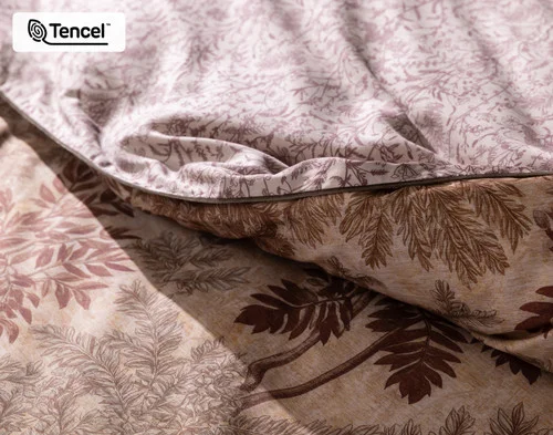 Close up on the folded surface of our Henna Leaf Duvet Cover.