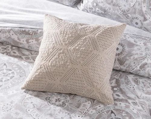 Our Romano Square Cushion Cover atop our Romano Duvet Cover.