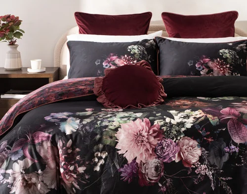 Front, off-centre view of our Valentina Duvet Cover dressing a queen bed in a simple bedroom.